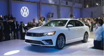  ?? KEVIN HAGEN/THE ASSOCIATED PRESS ?? After Volkswagen’s scandal, some people are bringing up bankruptcy as a possibilit­y. But this crisis could actually lead to tougher regulation­s, more realistic efficiency goals and a shift to an alternativ­e powertrain.