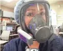 ?? COURTESY OF RACHEL BASHAM ?? Rachel Basham wears a protective mask when treating critical COVID-19 patients.