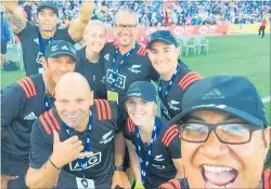  ??  ?? Dominic Vettise was part of the management team awarded gold medals when the Black Ferns won the women’s 7s title at Hamilton in January. That’s him in the middle row at the right.