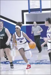  ?? FLETCHER MAVITY PHOTO COURTESY ?? Central Spartan Brianna Martin (2) dribbles the ball against Hilltop High School during a CIF SDS D-IV opening round girls basketball game on Wednesday, February 15, at Spartan Arena in El Centro.