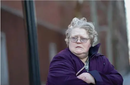  ?? FAITH NINIVAGGI / HERALD STAFF ?? ‘SO SORRY’: Former Bedford VA Medical Center nurse Patricia Waible leaves federal court in Boston on Friday after being sentenced to one year of probation for playing video games while a Vietnam vet was dying.
