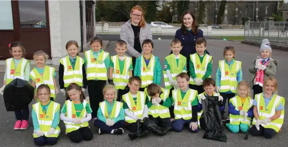  ??  ?? These children from Kilbrin National School, with their teachers Lisa Buckley and Catriona Murphy, undertook a school clean up last week.