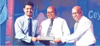  ??  ?? Hall of Fame Award Winners receiving their awards from Mr Ajith Gunawarden­a, Chief Executive Officer and Patrick Alwis, Managing Director.