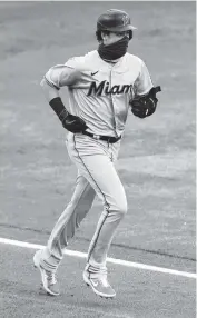  ?? JEFFREY T. BARNES AP ?? Brian Anderson rounds the bases after hitting a home run against the Toronto Blue Jays during the second inning.