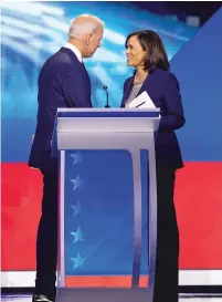  ?? RUTH FREMSON/NEW YORK TIMES FILE PHOTO ?? Former Vice President Joe Biden speaks with Sen. Kamala Harris, D-Calif., after the Democratic presidenti­al debate Sept. 12 in Houston. Progressiv­e Democrats now find themselves led by two moderates with relatively cautious political instincts, even as activist energy courses through the party and left-wing challenger­s unseat some incumbents.