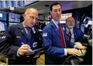  ?? ASSOCIATED PRESS ?? Trading on the New York Stock Exchange picked up Wednesday, but the S&amp;P 500 remains down 3.2 percent so far this week.