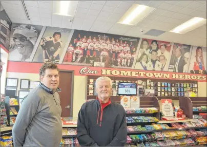  ?? COLIN MACLEAN /JOURNAL PIONEER ?? Ryan Simmonds, site manager with Mel’s Petro Canada on Granville Street in Summerside, with city native and former NHLer Errol Thompson. Thompson is one of a number of local sports icons Mel’s is honouring at its store.