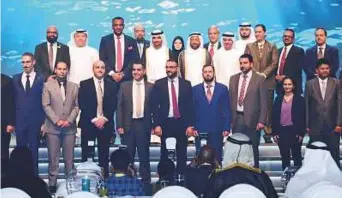  ?? Atiq ur Rehman/Gulf News ?? Awardees with Shaikh Abdullah bin Salem Al Qasimi, Deputy Ruler of Sharjah during the Sharjah Economic Excellence Award at Sharjah Expo on Wednesday.