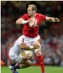  ?? AP ?? FLyING hIGh: Wales’ Alun Wyn Jones (foreground) and England’s Anthony Watson battle for the ball. —