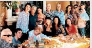 ??  ?? The whole clan: Last summer, Kirk enjoyed dinner with four generation­s of his family. Above from left to right, Kirk, Jason, Dylan, Michael, Anne, Carys, Kelsey, Peter, Catherine Zeta-jones, Joel, Lisa, Viviane, Cameron & Lua