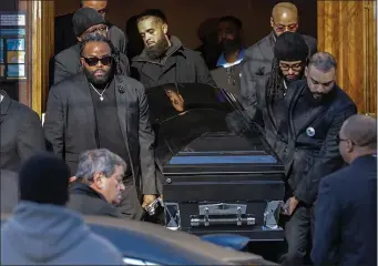  ?? PAUL CONNORS — BOSTON HERALD ?? Hundreds of community members turned out to St. Paul A.M.E. Church in Cambridge on Saturday to bid their final farewell to Roderick Jackson, a 36-year-old National Grid utility worker who died on the job the afternoon of Dec. 6.