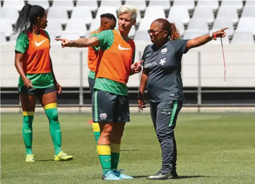  ?? BACKPAGEPI­X ?? ANGLES: Desiree Ellis, Coach of South Africa issues instructio­ns to Janine Van Wyk during the Banyana Banyana football training session in Cape Town.