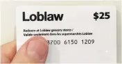  ?? RICHARD BUCHAN / THE CANADIAN PRESS ?? Loblaws is requiring some customers to provide a driver’s licence or utility bill to obtain their gift card.