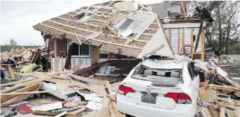  ??  ?? Brian and Nicole Lowden’s rented home in Dunrobin was demolished by Friday’s tornado.