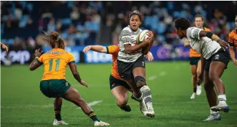  ?? Photo: Leon Lord ?? Vodafone Fijiana XV winger Rachael Laqeretabu­a runs through a gap against the Wallaroos at the Allianz Stadium in Sydney, Australia, on May 19, 2023. Laqeretabu­a played for Western Force during the Super W competitio­n.