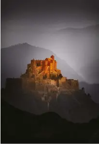  ??  ?? AboveEXTRA HEIGHT The castle at cardona in spain is a wide, sprawling affair, but by squishing the scene in postproduc­tion, it is able to be given more height and greater impact