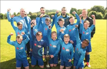  ??  ?? North End United celebrate after winning the Under-11 Jack Carthy Memorial Cup.