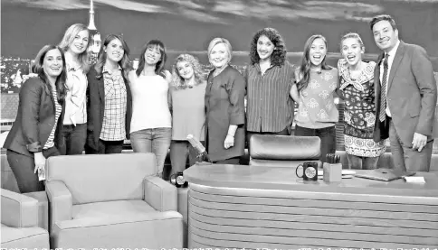 ?? — Courtesy of NBC ?? ‘Tonight Show’ writers Albertina Rizzo (left to right), Becky Krause, Caroline Eppright, Marina Cockenberg, Jo Firestone, guest Hillary Rodham Clinton, Jasmine Pierce,Taryn Englehart, guest Miley Cyrus and host Fallon during ‘Thank You Notes’ to Clinton.