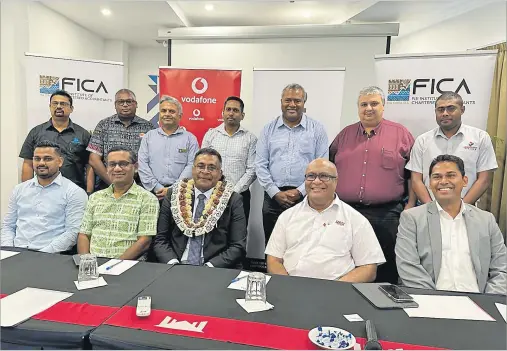  ?? Picture: SUPPLIED ?? Vodafone Fiji chief commercial officer Salman Khan (sitting far left) joins Deputy PM and Trade Minister Manoa Kamikamica (2nd from right), Assistant Finance Minister Esrom Immanuel and FICA members during the FICA 2024 Annual Congress launch and rebranding in Suva earlier this month.