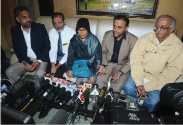  ??  ?? Relatives of Hamid, mother Fauzia Ansari (centre) along with her husband Nehal Ansari (second right) and elder son Dr Khalid Ansari (second left), speak to the media ahead of the deportatio­n of Hamid from Pakistan, in Amritsar. — AFP photo