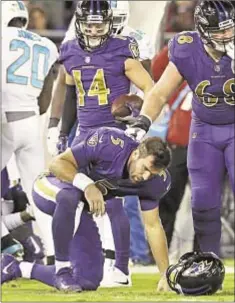  ?? GETTY ?? Joe Flacco suffered concussion on vicious hit Thursday, which his Ravens teammates have labeled a dirty play.