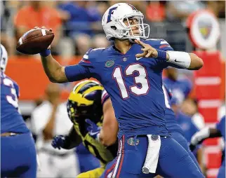  ?? RONALD MARTINEZ / GETTY IMAGES ?? Feleipe Franks, who struggled last season as a freshman for Florida, has become more of a leader on and off the field, first-year coach Dan Mullen says.