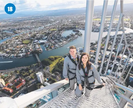  ??  ?? Harrison Norris and Emily Tate take on Skypoint Climb at Q1 on the Gold Coast.