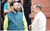  ??  ?? Union Ministers Prakash Javadekar and Jitendra Singh after a Cabinet meeting at South Block in New Delhi on Thursday