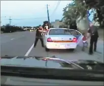  ?? ST. ANTHONY POLICE DEPARTMENT VIA THE ASSOCIATED PRESS ?? A video taken from a camera in a police cruiser captures the police shooting of Philando Castile during a traffic stop in Falcon Heights, Minn. The shooting inspired an Arizona lawmakers to seek changes in the state’s driving rules that inform...