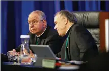  ?? ASSOCIATED PRESS 2018 ?? Archbishop Jose Gomez, of Los Angeles, (left) is a proponent of immigratio­n policy that would diminish “migrants being talked about ... as if they are somehow beneath caring about.”