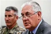  ?? Alex Brandon / Associated Press ?? Secretary of State Rex Tillerson on Monday flew to the main U.S. air base in Afghanista­n, where he was greeted by Gen. John Nicholson.