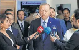  ?? REUTERS ?? Recep Tayyip Erdogan talks to the press after casting his vote in Istanbul on Sunday.