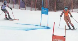  ?? ?? Guide Zianne Khalifa, right, leads Hayden Denouden down the hill at Ski Wentworth during a race on Feb. 11.