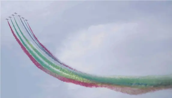  ??  ?? Al Fursan aerobatic team leaves colourful smoke trails during the fourth Union Fortress in Fujairah on Friday Wam