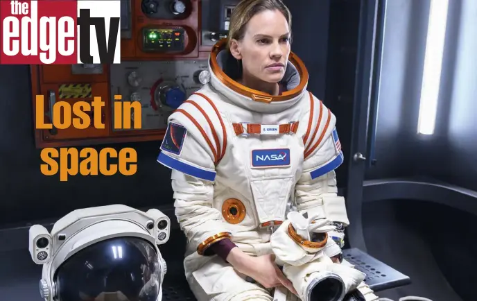  ??  ?? READY TO LAUNCH: Leading a mission to Mars requires astronaut Emma Green (Hilary Swank, above) to be ‘Away’ from her family (Swank, Josh Charles and Talitha Bateman, below from left).