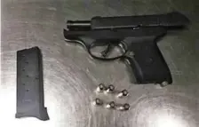  ?? COURTESY OF THE TSA ?? LOCKED AND LOADED: This loaded handgun and additional clip were spotted in the carry-on bag of a New Hampshire resident at a Boston Logan Internatio­nal Airport checkpoint on Sunday.