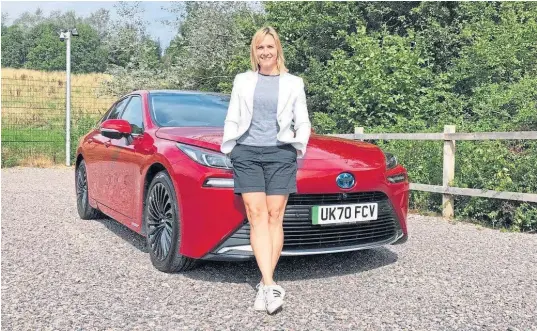  ?? ?? TOPPING UP THE TANK: Vicki explores the world of hydrogen power in the Toyota Mirai, left. Fuel supply issues caused huge frustratio­n at the pumps last week, below left. Hydrogen power is an option, but hydrogen fuel stations are few and far between at the moment.