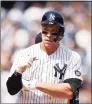  ?? Adam Hunger / Associated Press ?? The New York Yankees’ Aaron Judge reacts after hitting a double during the fifth inning against the Seattle Mariners on Saturday.