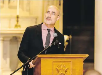  ?? AP ?? Author Arthur C. Brooks speaks at the Washington National Cathedral in Washington, D.C., in 2021. Brooks is a happiness social researcher and author of the book, From Strength to Strength, about finding success, happiness and deep purpose in the second half of life.