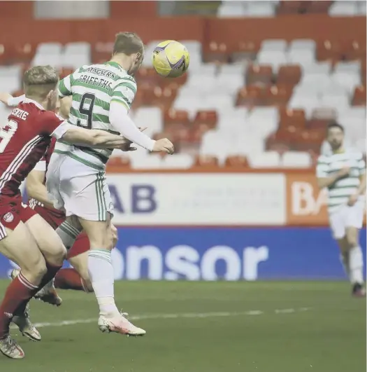  ??  ?? Mohamed Elyounouss­i’s cross to head home Celtic’s stoppage-time equaliser at Pittodrie last night