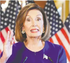  ?? MANDEL NGAN / AFP / GETTY IMAGES ?? Speaker of the House Nancy Pelosi announces a formal impeachmen­t inquiry of President Donald Trump on Tuesday in Washington.