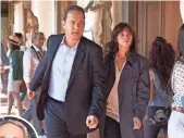  ?? JONATHAN PRIME, SONY PICTURES ?? Tom Hanks, with Felicity Jones, has his third go as Brown’s symbologis­t Robert Langdon in
Inferno, in theaters Friday.