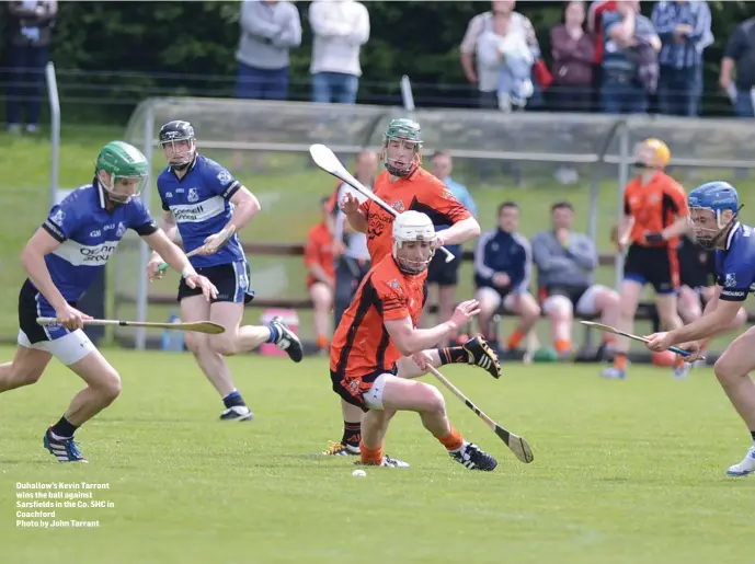  ?? Photo by John Tarrant ?? Duhallow’s Kevin Tarrant wins the ball against Sarsfields in the Co. SHC in Coachford