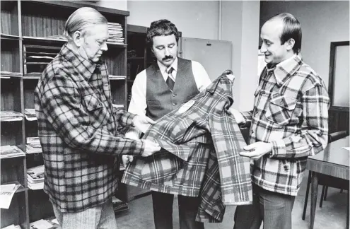  ?? PHOTO: OTAGO DAILY TIMES FILES ?? ‘‘Now, that one should do well overseas,’’ export manager for Alliance Textiles Limited, Peter Van Mulbregt (left) says, while testing the quality of the Swanndri ‘‘kahu’’ jacket in June 1978. He is watched by general sales manager, John McLean, and...