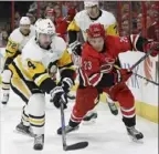  ?? Associated Press ?? Brock McGinn (23) spent the first six years of his career with the Carolina Hurricanes, who drafted him in the second round in 2012, before sining with the Penguins last week.