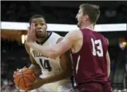  ?? CHRIS SZAGOLA — THE ASSOCIATED PRESS ?? Villanova’s Omari Spellman, left, looks to make his move on Lafayette’s Matt Klinewski, right, during the second half of an NCAA college basketball game, Friday in Allentown, Pa.