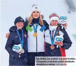  ?? FOTO: REUTERS ?? Taja Bodlaj (na sredini) si je pred kratkim v Gangvonu priskakala naslov mladinske olimpijske prvakinje.