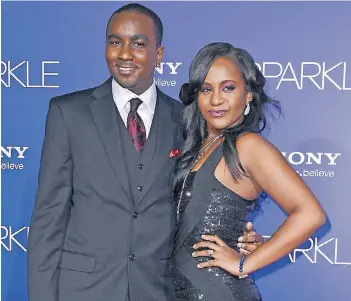  ?? FOTO: DPA ?? Baseball-Profi Nick Gordon und Bobbi Kristina Brown hatten eine schwierige Beziehung. Die beiden waren gemeinsam aufgewachs­en und verlobten sich im Juli 2014.