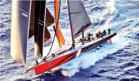  ?? — AFP photo ?? This handout from Rolex/Studio Borlenghi taken and released on December 27, 2018 shows Australian Supermaxi yacht Comanche competing in the Sydney to Hobart yacht race near Tasmania.