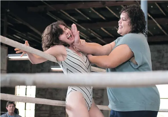  ?? — PHOTOS: NETFLIX ?? GLOW, starring Alison Brie, left, and Britney Young, does not feature any of the women from the original series.